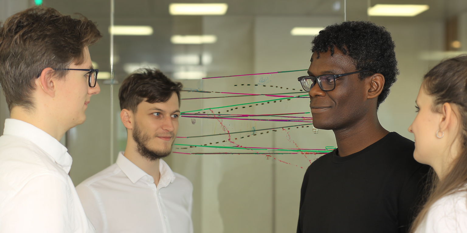 undefined International team of developers collaborating on complex Life Science software architecture with flat hierarchy culture